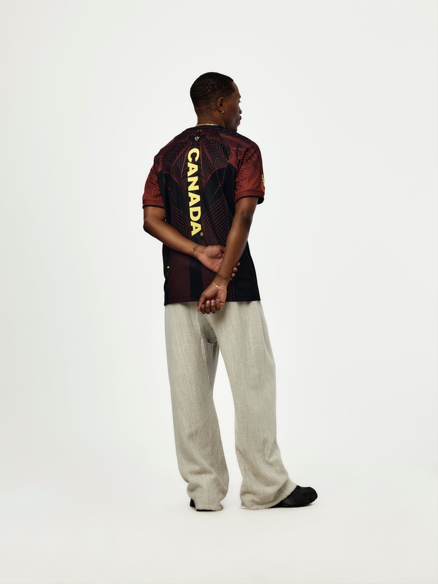 NOCTA X CANADA NIKE JERSEY (BLACK/UNIVERSITY RED/SONIC YELLOW)