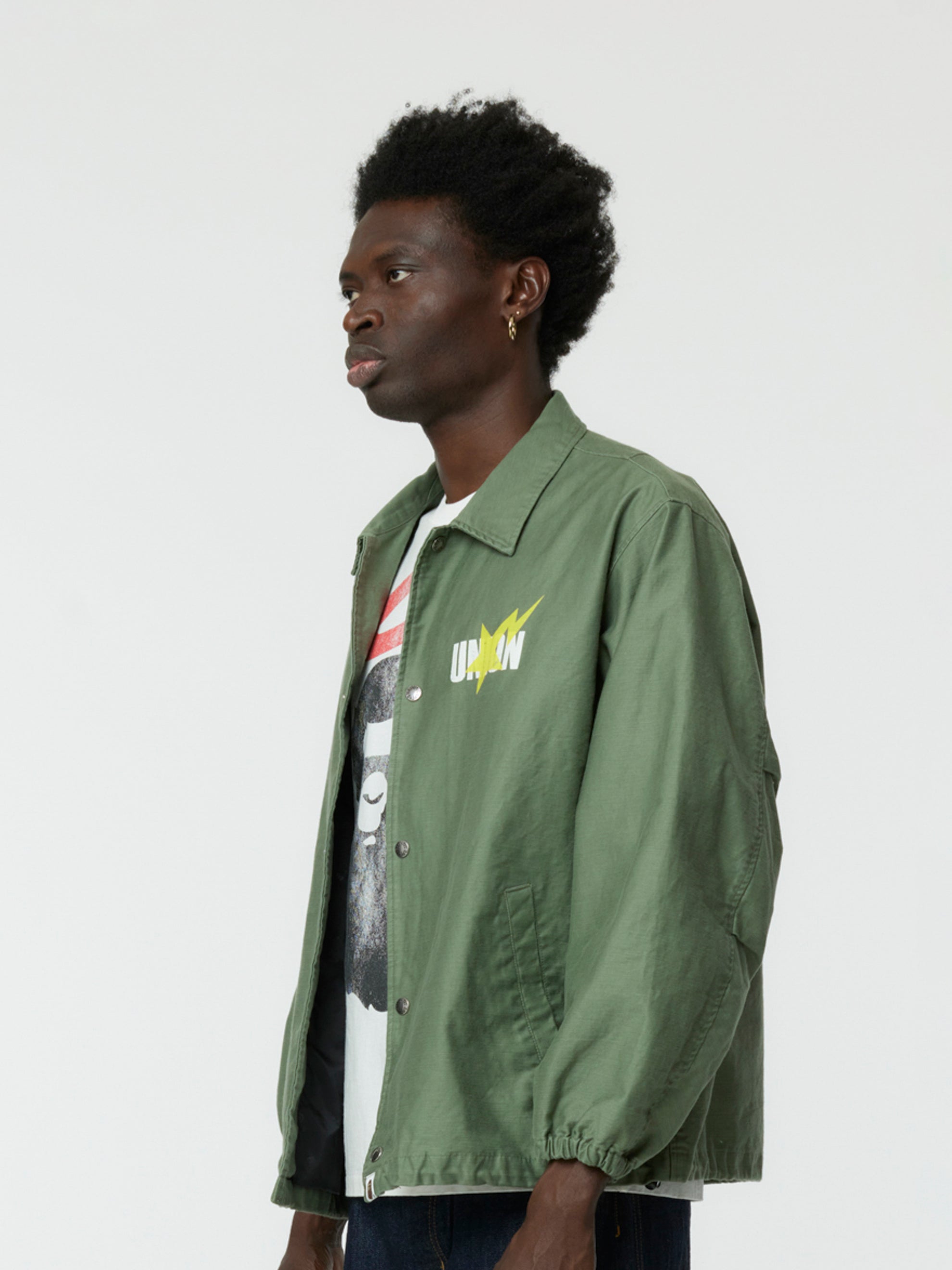 Olive green coach jacket best sale