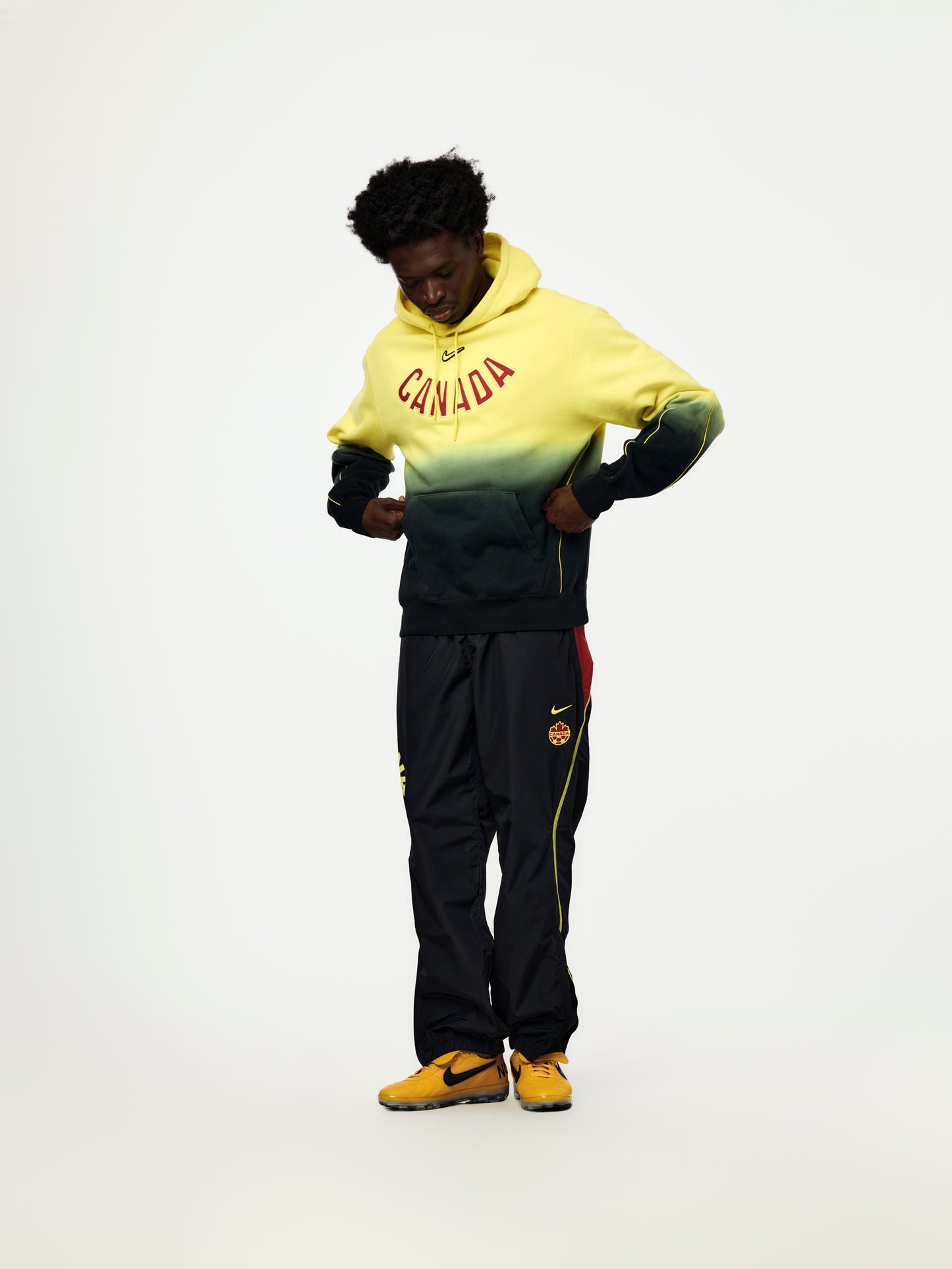 Canada x NOCTA x Nike CS Hoodie (Sonic Yellow/Black/Gym Red)