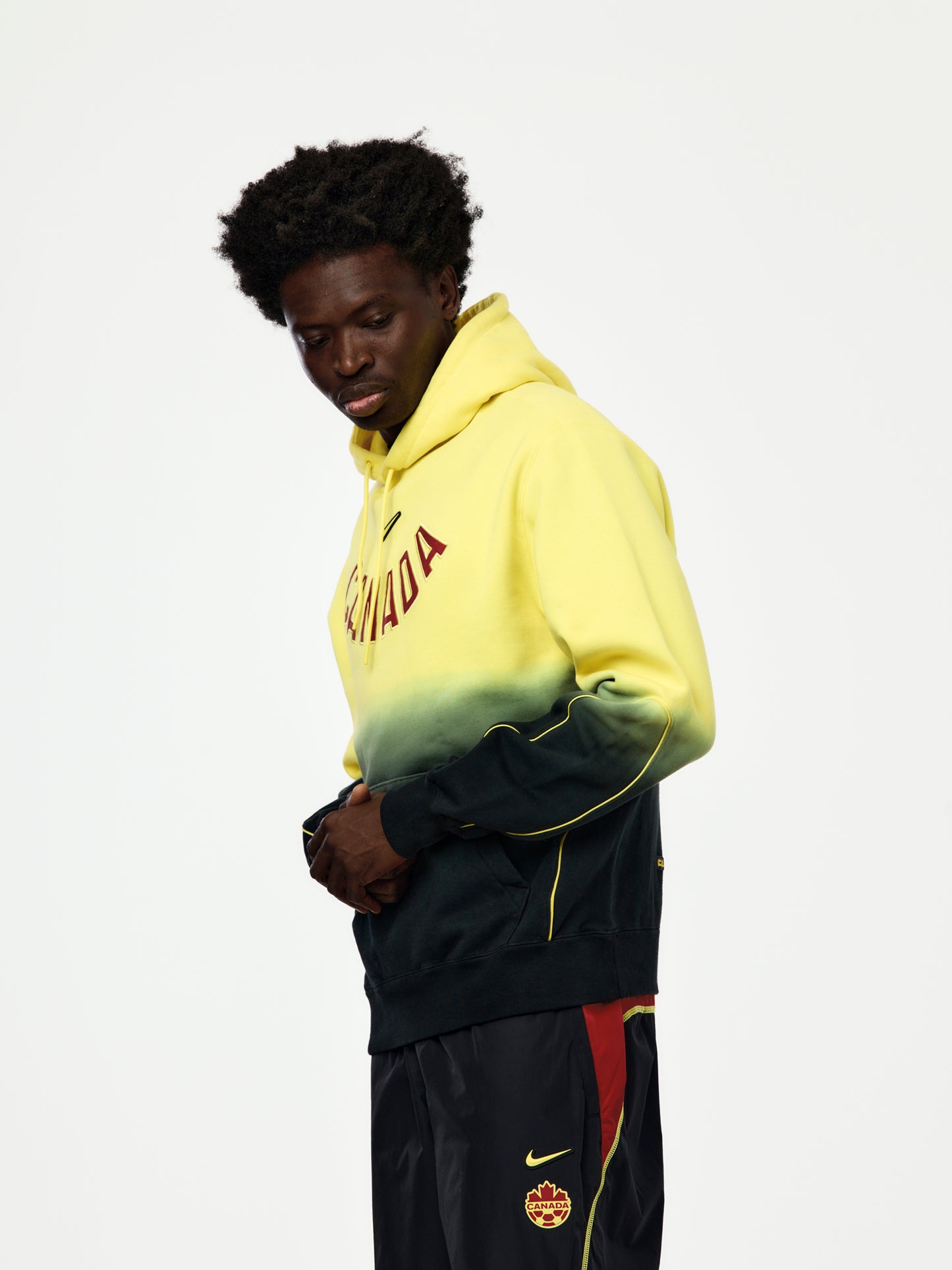 Canada x NOCTA x Nike CS Hoodie (Sonic Yellow/Black/Gym Red)