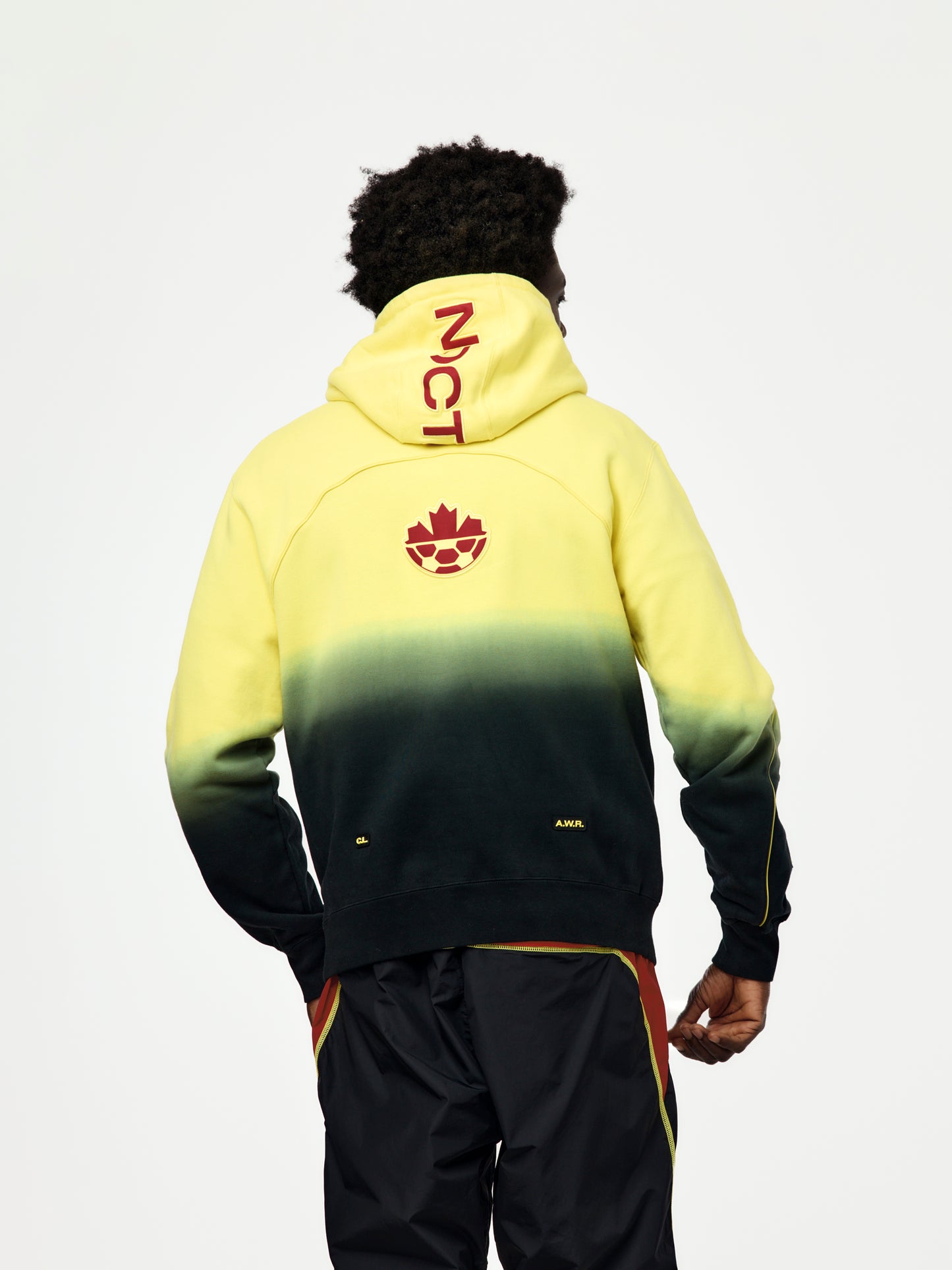 Canada x NOCTA x Nike CS Hoodie (Sonic Yellow/Black/Gym Red)