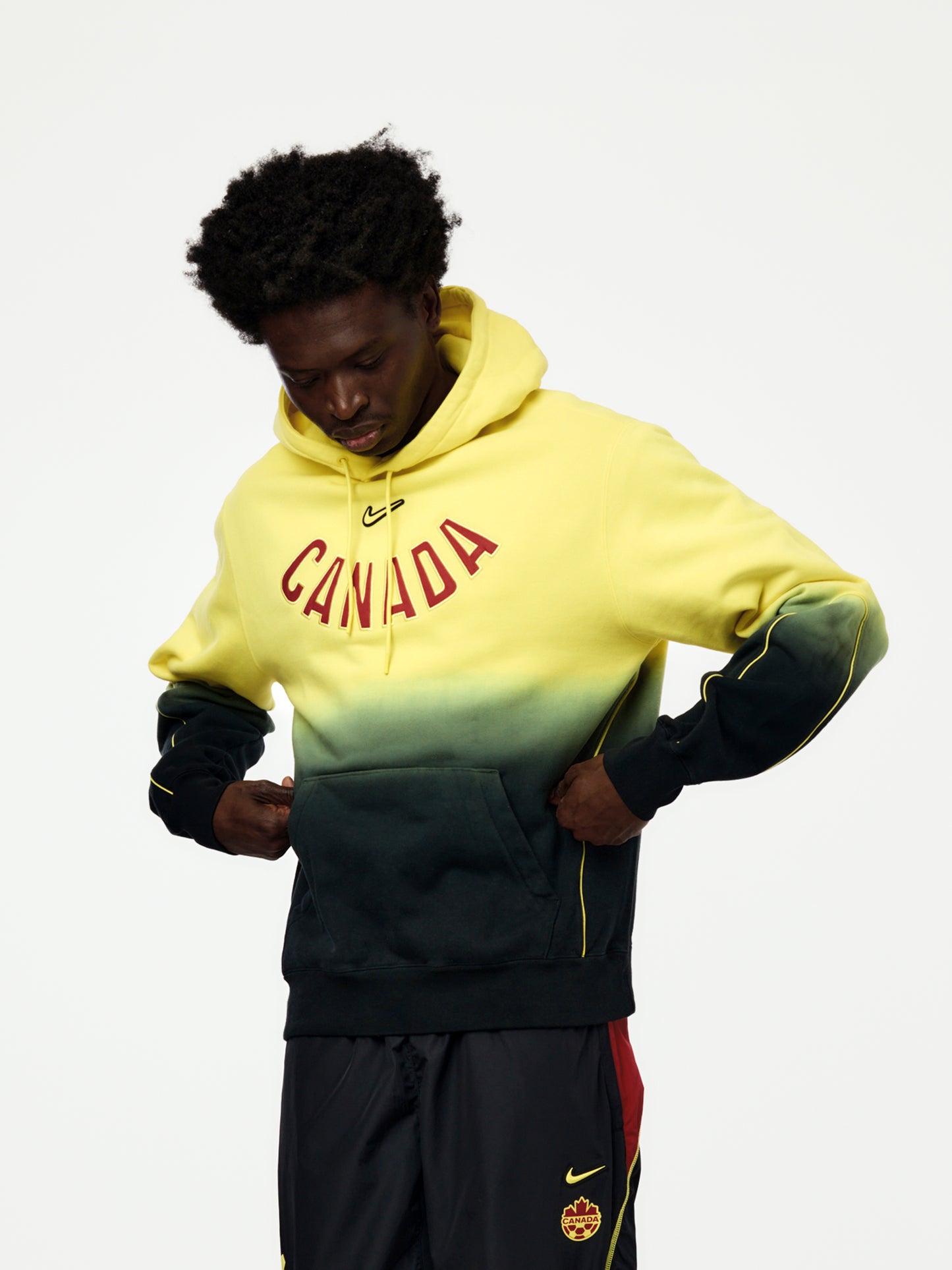 Canada x NOCTA x Nike CS Hoodie (Sonic Yellow/Black/Gym Red)