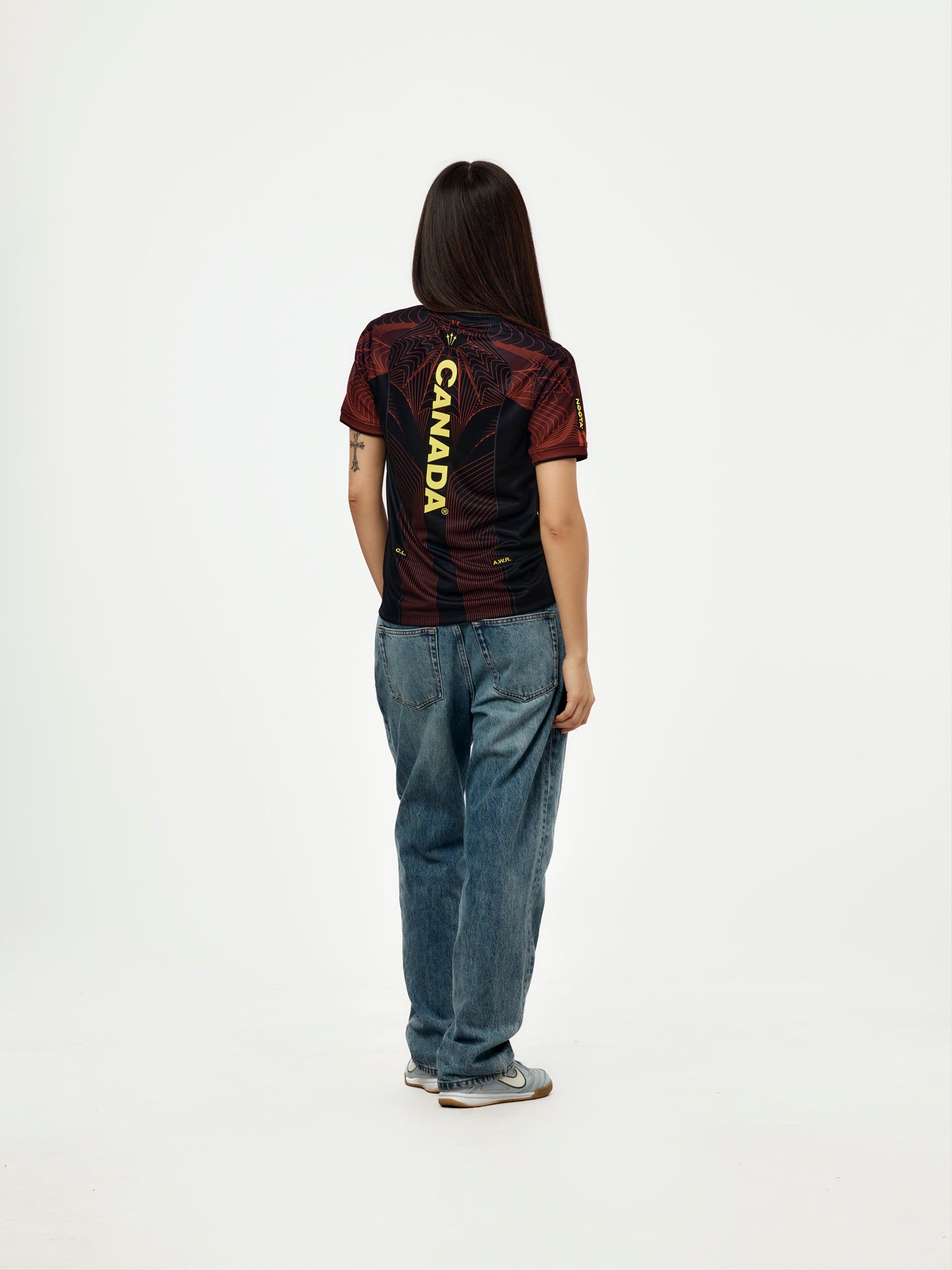 Canada x NOCTA x Nike Youth Dri-Fit Soccer Pre-Match Short-Sleeve Top (Black/University Red/Sonic Yellow)