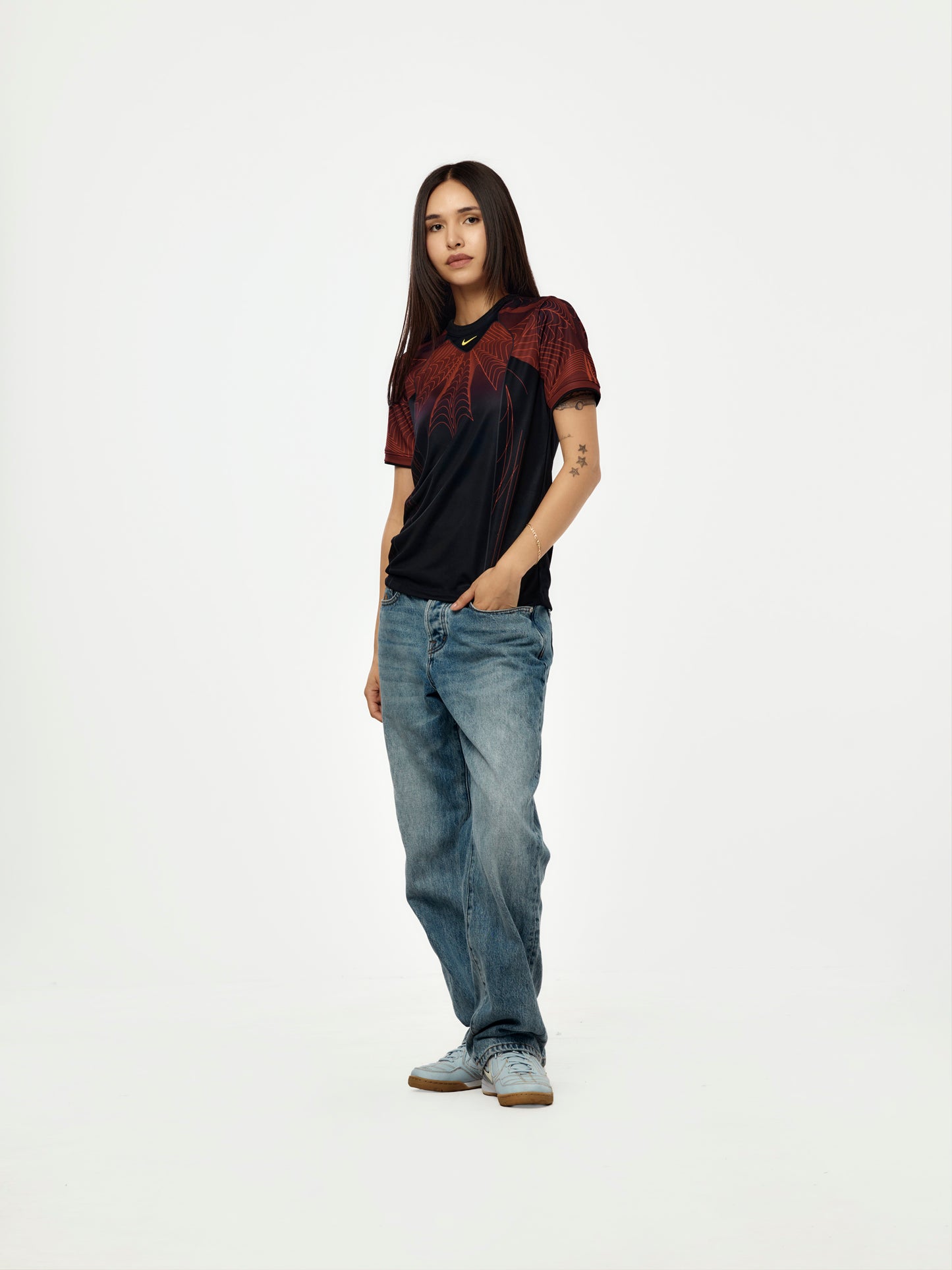 Canada x NOCTA x Nike Youth Dri-Fit Soccer Pre-Match Short-Sleeve Top (Black/University Red/Sonic Yellow)