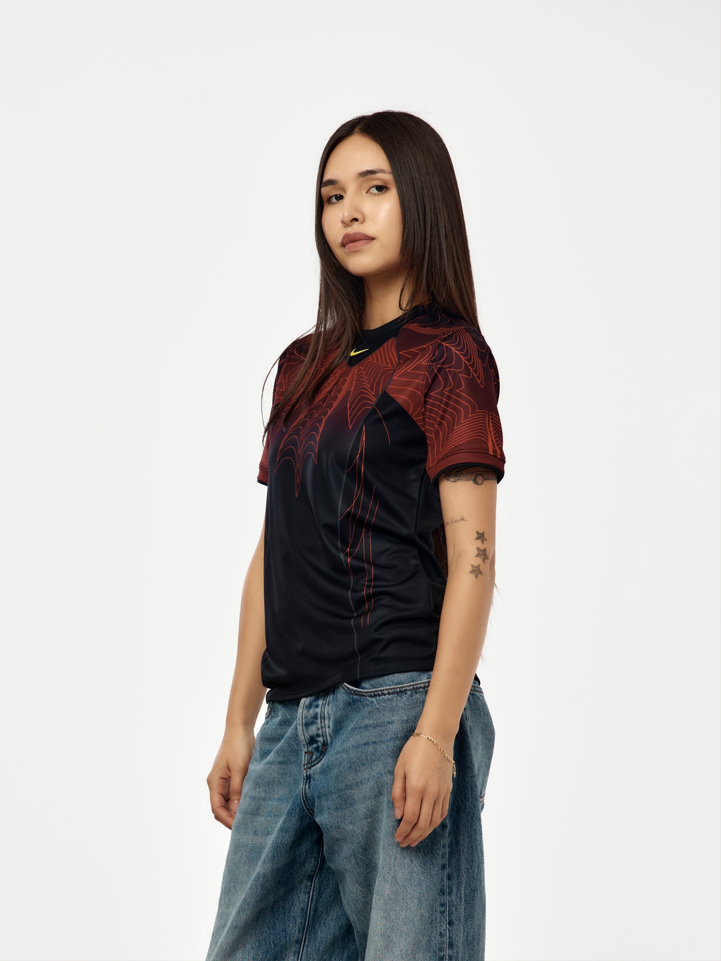 Canada x NOCTA x Nike Youth Dri-Fit Soccer Pre-Match Short-Sleeve Top (Black/University Red/Sonic Yellow)