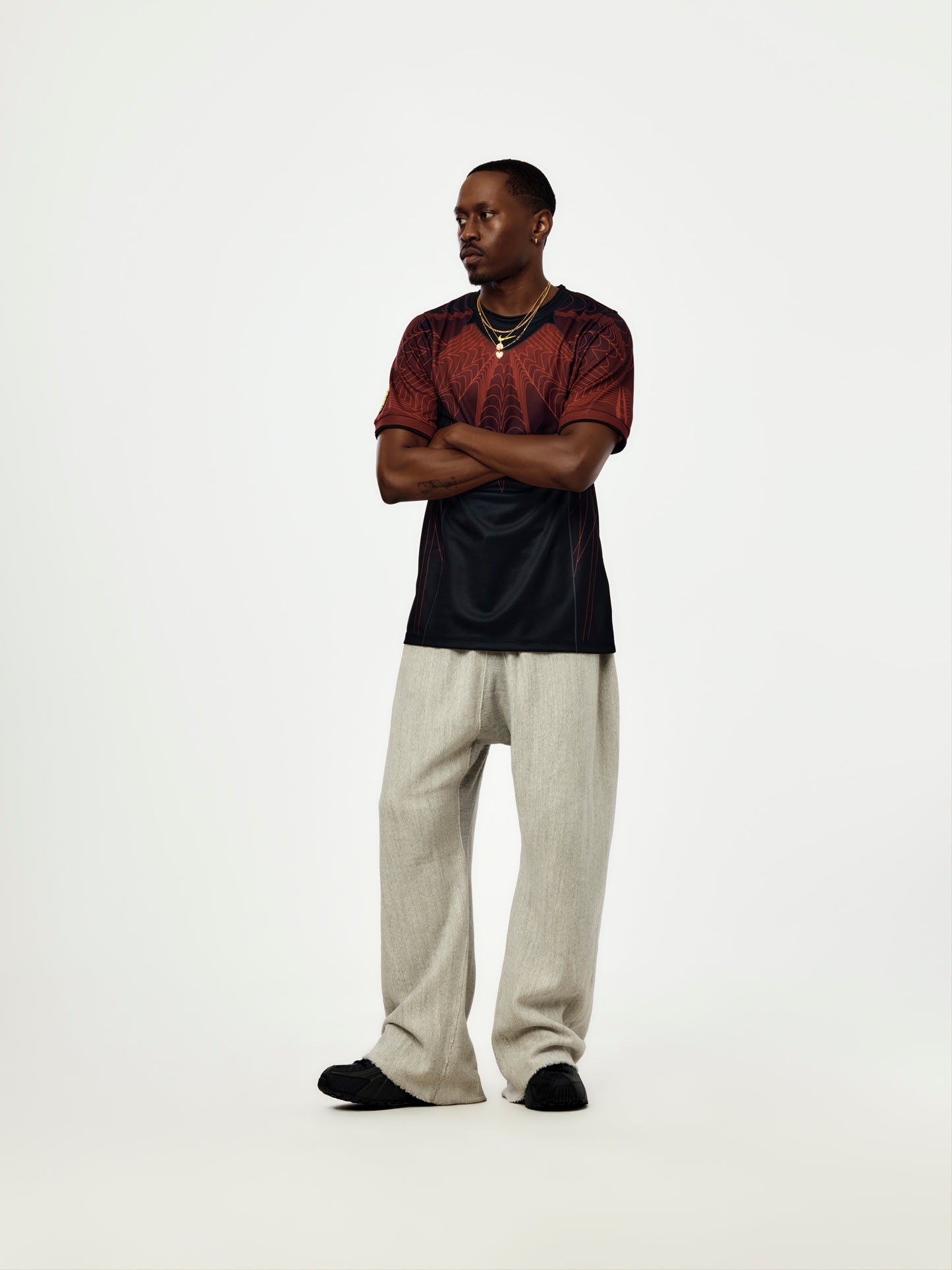 NOCTA X CANADA NIKE JERSEY (BLACK/UNIVERSITY RED/SONIC YELLOW)