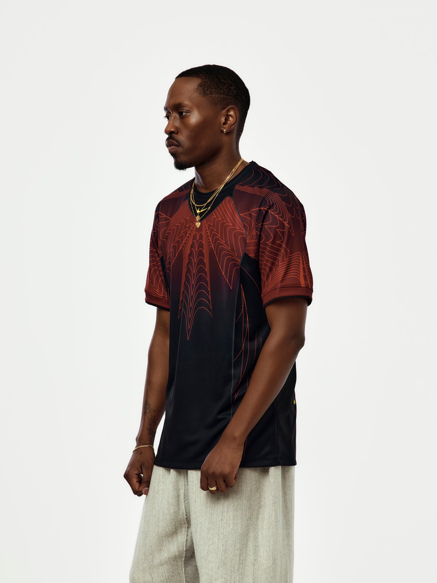 NOCTA X CANADA NIKE JERSEY (BLACK/UNIVERSITY RED/SONIC YELLOW)