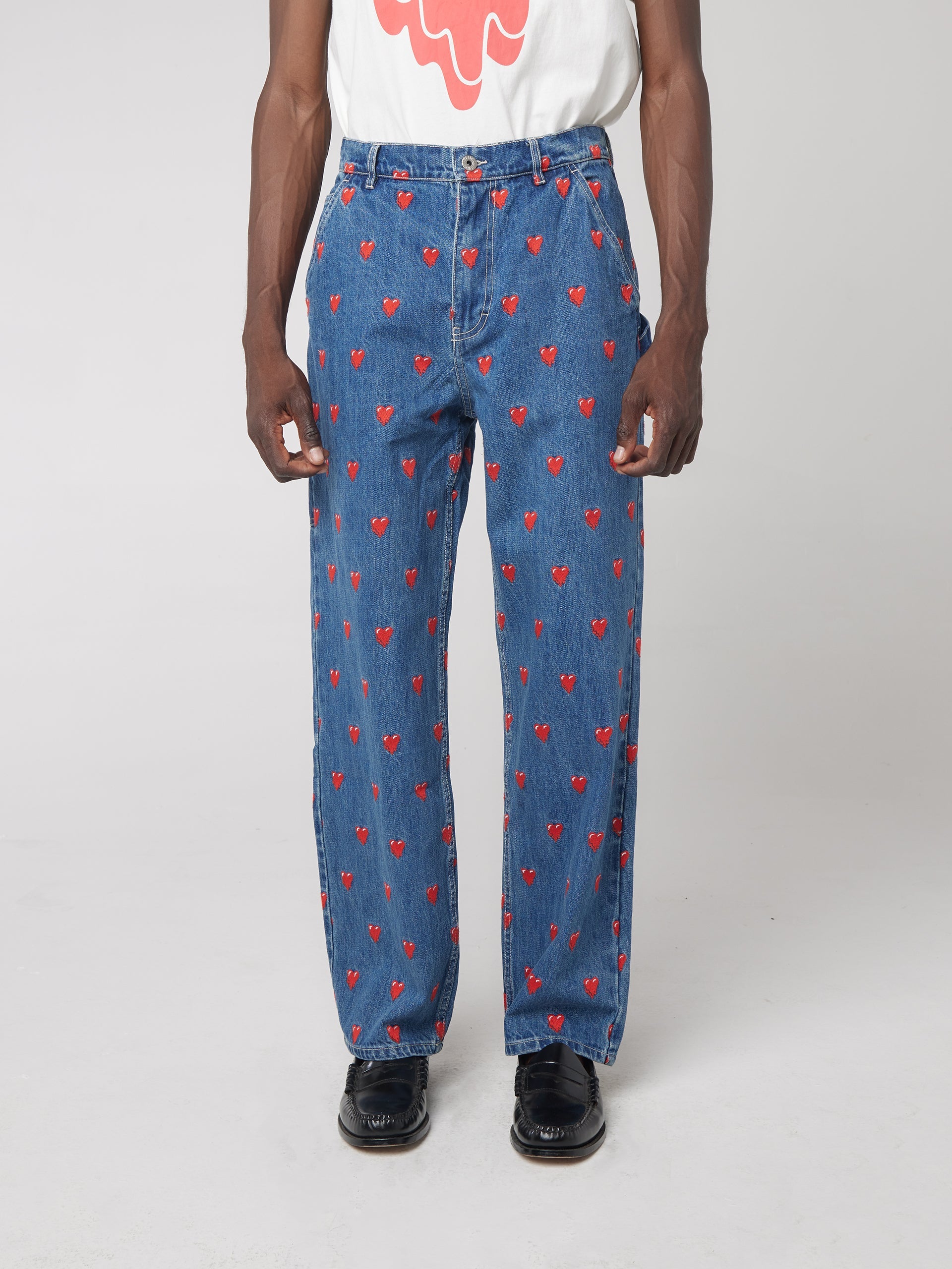 EU LOGO PATTERN DENIM PANTS